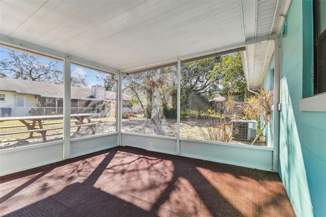 unfurnished sunroom featuring a wealth of natural light