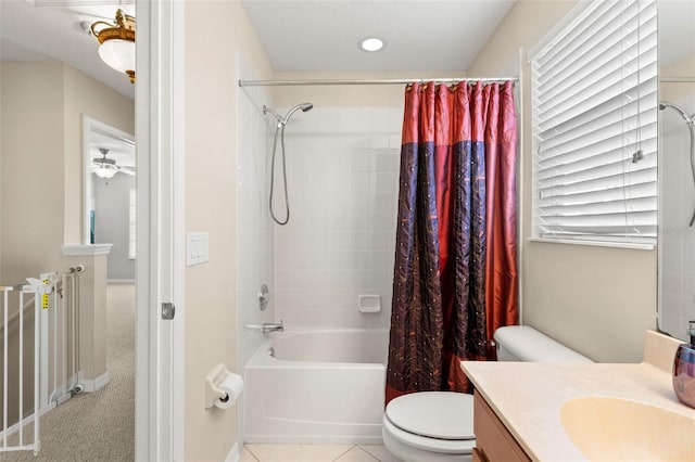 full bathroom featuring shower / tub combo, vanity, tile patterned flooring, and toilet