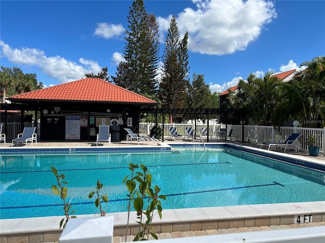 view of pool with a pergola