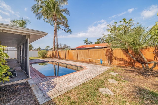 view of swimming pool featuring a patio area