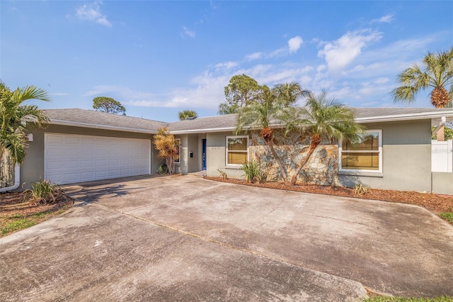 single story home with a garage