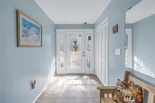 entryway featuring light tile patterned flooring