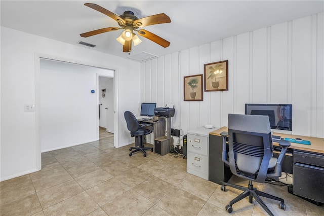 office space featuring light tile patterned floors and ceiling fan