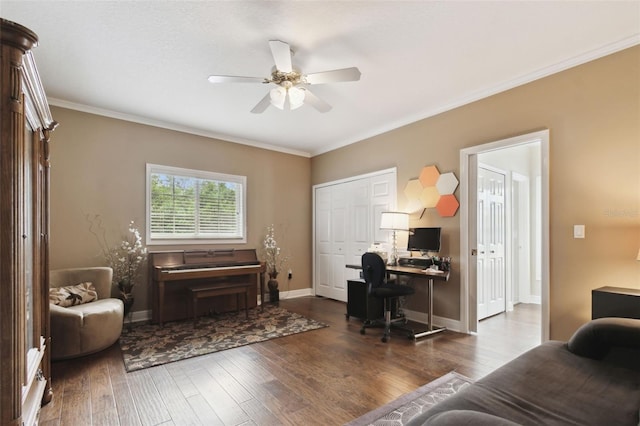 office space with crown molding, dark wood-type flooring, and ceiling fan