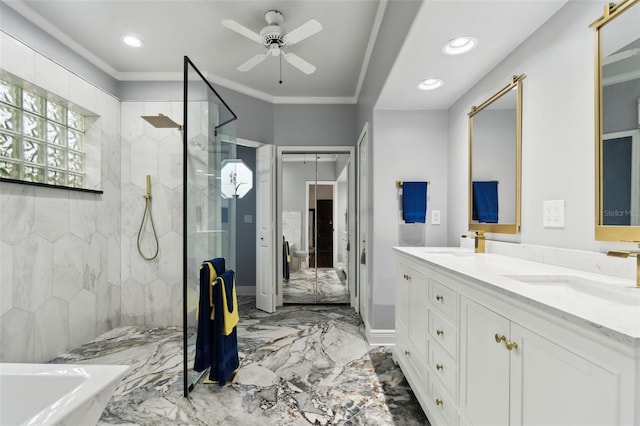 bathroom featuring ceiling fan, ornamental molding, vanity, and a tile shower