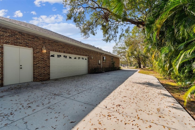 view of home's exterior with a garage