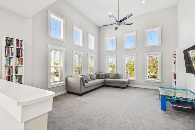 interior space featuring ceiling fan