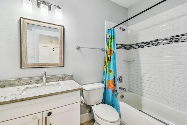 full bathroom featuring vanity, shower / bath combination with curtain, and toilet