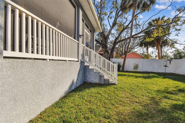 exterior space featuring a lawn