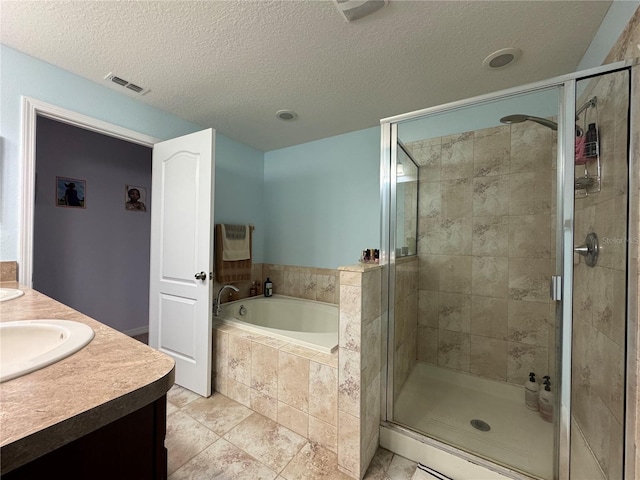 20314 Starfinder Way, Tampa, FL 33647 - bathroom with vanity, separate shower and tub, and a textured ceiling