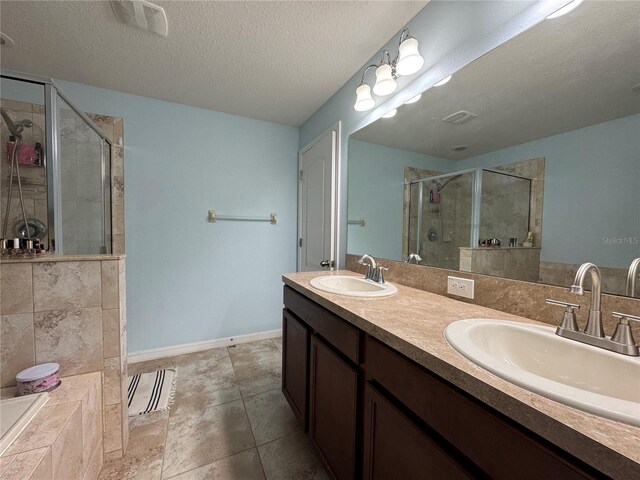 20314 Starfinder Way, Tampa, FL 33647 - bathroom featuring vanity, shower with separate bathtub, and a textured ceiling