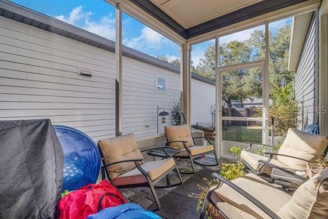 sunroom featuring plenty of natural light