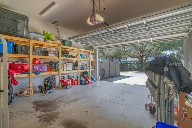 garage featuring a garage door opener