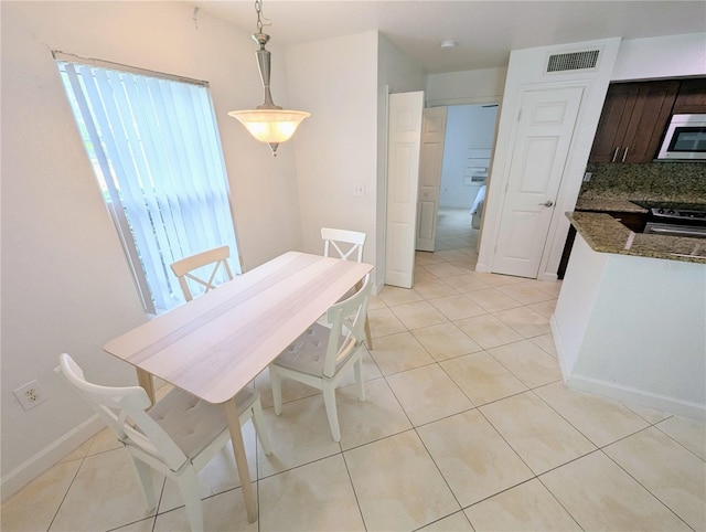 view of tiled dining area