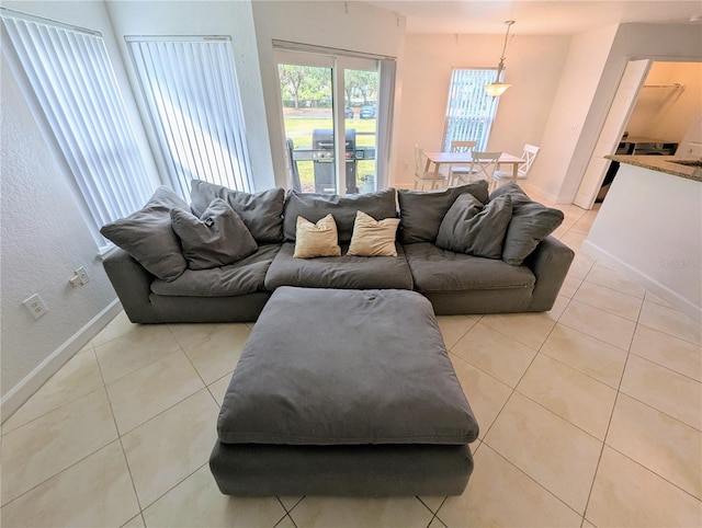 living room with light tile patterned floors