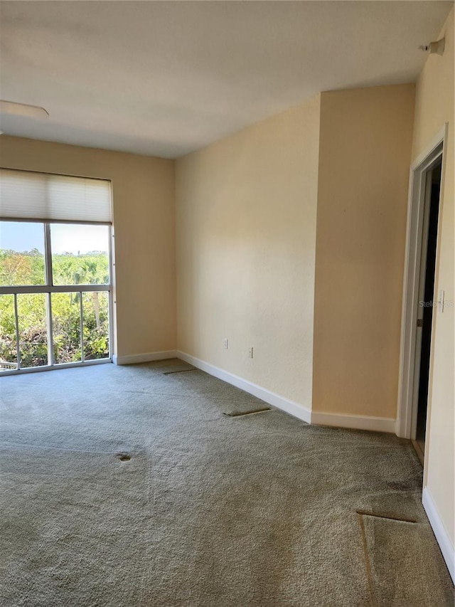 view of carpeted spare room