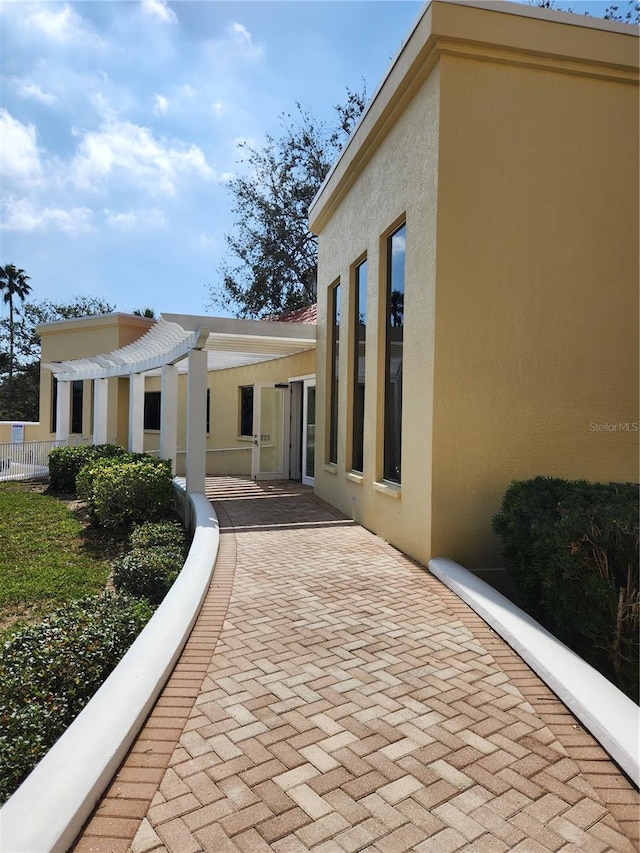 exterior space featuring a pergola