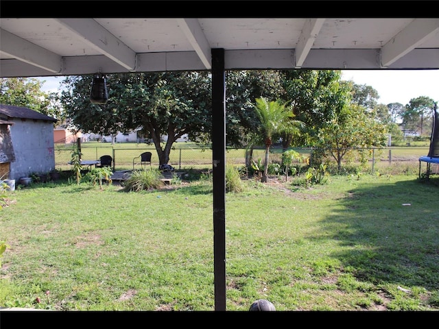 view of yard featuring a trampoline