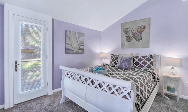 bedroom with lofted ceiling, carpet floors, and access to outside