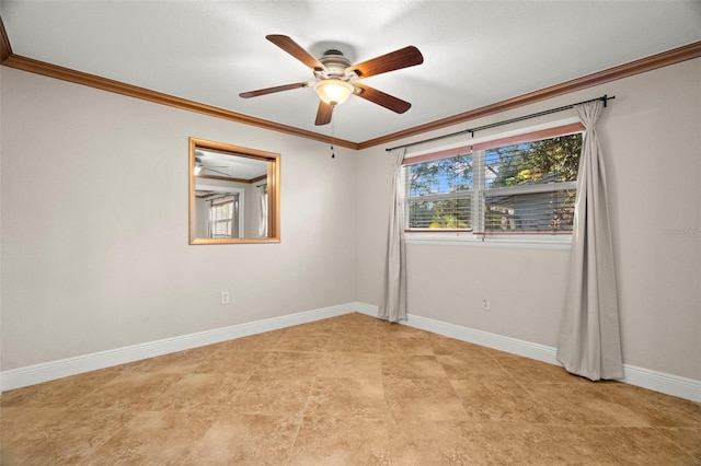 empty room featuring crown molding and ceiling fan