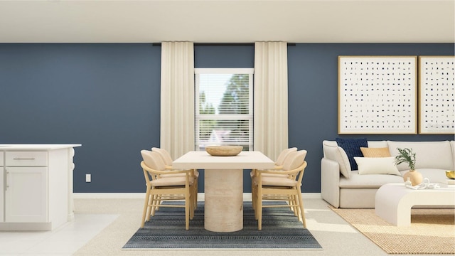 dining area featuring light colored carpet