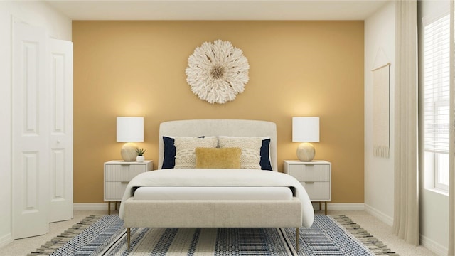 bedroom featuring light colored carpet