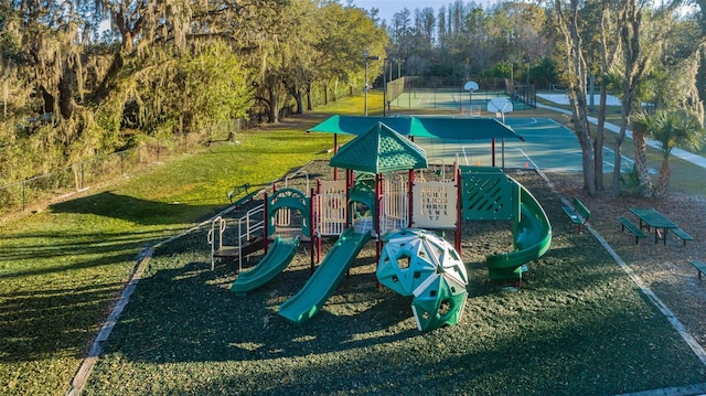 view of jungle gym with a lawn