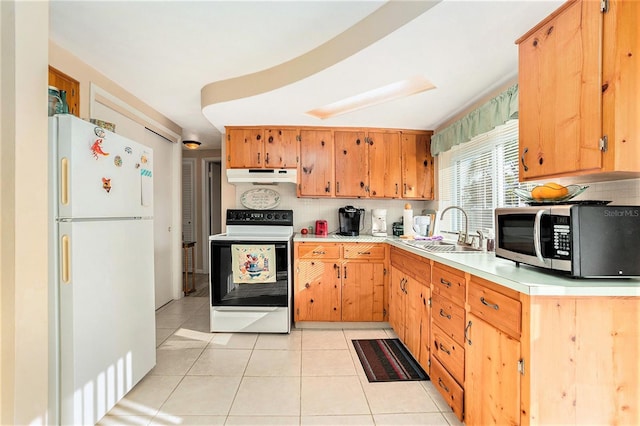 kitchen featuring tasteful backsplash, sink, white appliances, and light tile patterned floors