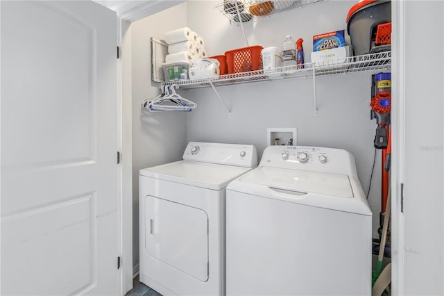 4221 W Spruce St Unit 1325, Tampa, FL 33607 - laundry room featuring washer and clothes dryer