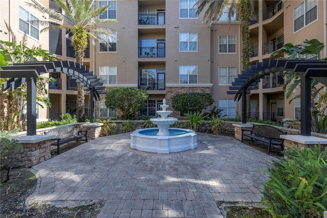 4221 W Spruce St Unit 1325, Tampa, FL 33607 - view of property's community with a patio area