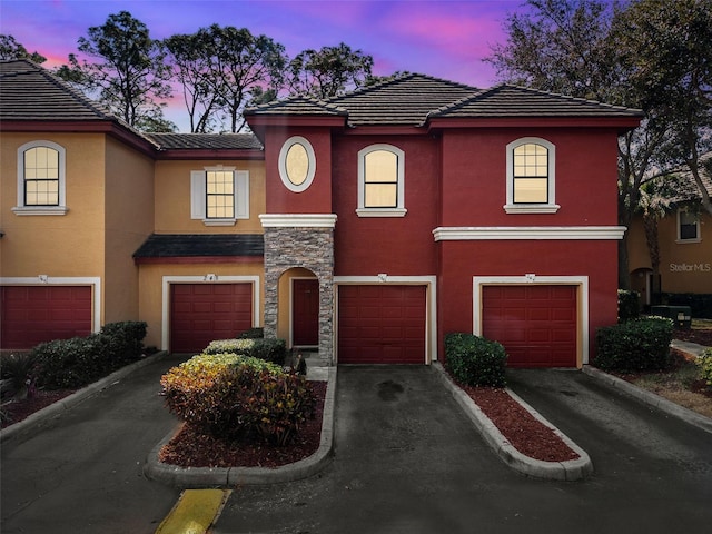 view of front of property featuring a garage