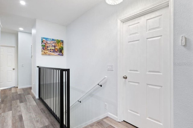 corridor featuring light hardwood / wood-style floors