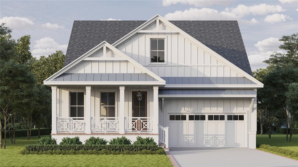 view of front facade with a garage and a front lawn