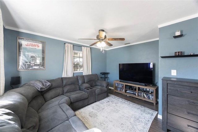 living room with crown molding, ceiling fan, and hardwood / wood-style floors