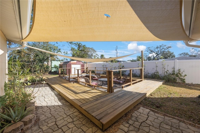 view of patio / terrace featuring a wooden deck