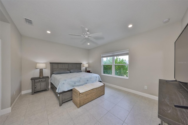 bedroom with recessed lighting, visible vents, a ceiling fan, a textured ceiling, and baseboards