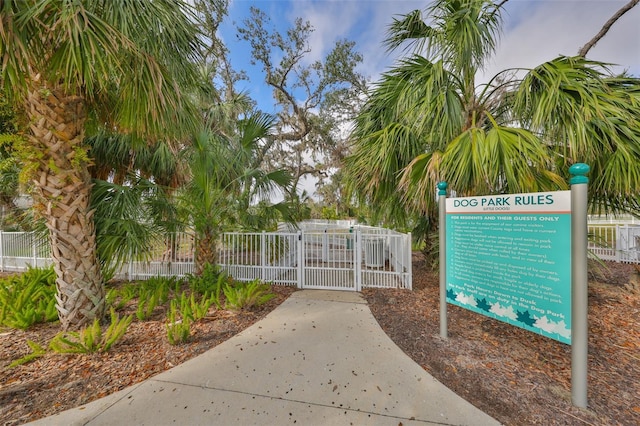 view of gate with fence