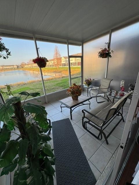 sunroom with a water view