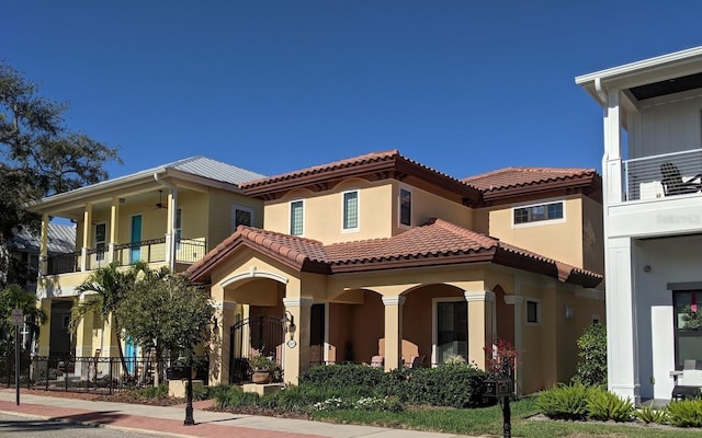 view of front of house with a balcony