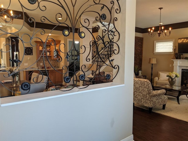 interior space featuring an inviting chandelier and wood-type flooring