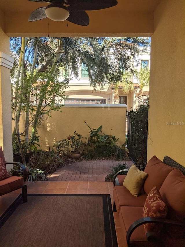 view of patio / terrace with an outdoor hangout area and ceiling fan