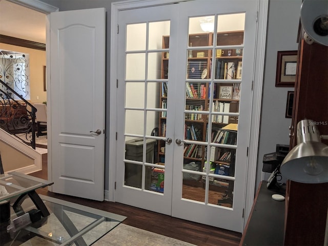 doorway to outside with dark hardwood / wood-style floors and french doors