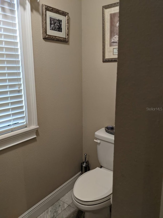 bathroom featuring toilet