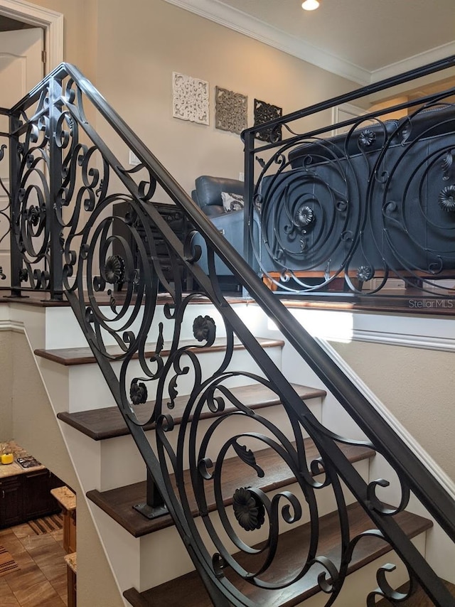 stairs featuring ornamental molding