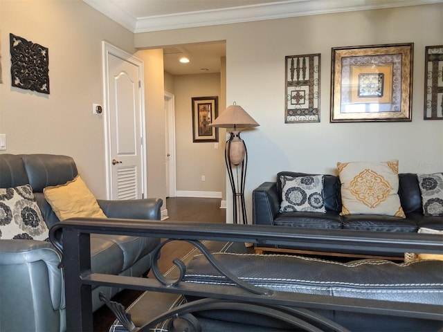 living room featuring crown molding