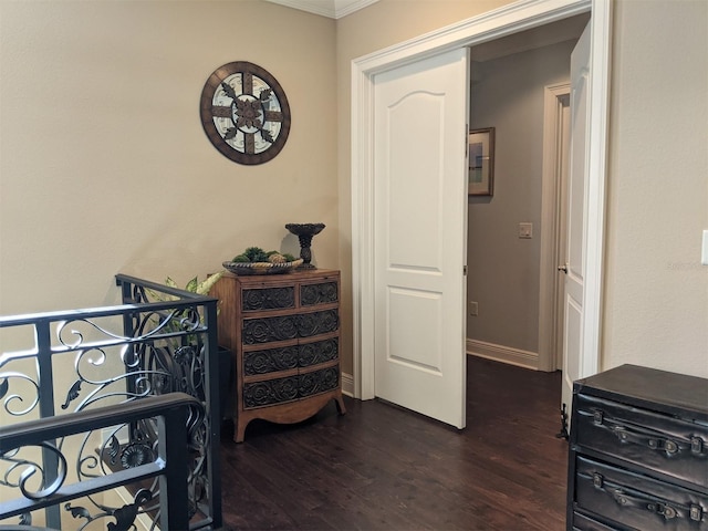 bedroom with dark hardwood / wood-style floors