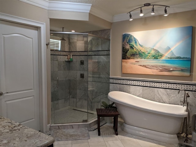 bathroom with tile walls, crown molding, tile patterned floors, and independent shower and bath