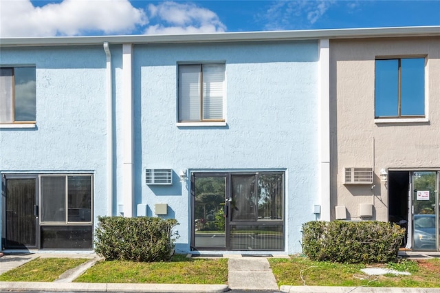 exterior space featuring stucco siding