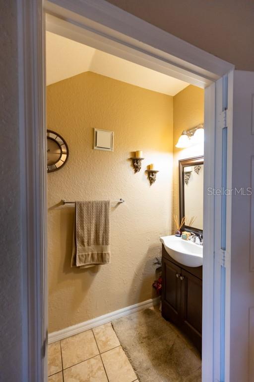 bathroom featuring vanity and tile patterned floors