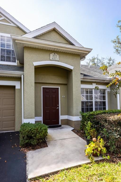 property entrance featuring a garage